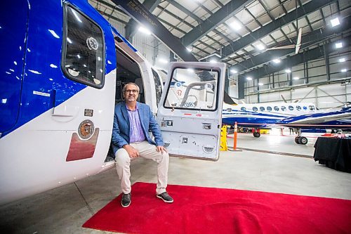 MIKAELA MACKENZIE / WINNIPEG FREE PRESS

Mike Pyle, CEO, poses for a portrait at the Exchange Income Corp. annual meeting in the Calm Air hangar in Winnipeg on Wednesday, May 11, 2022. For Martin Cash story.
Winnipeg Free Press 2022.
