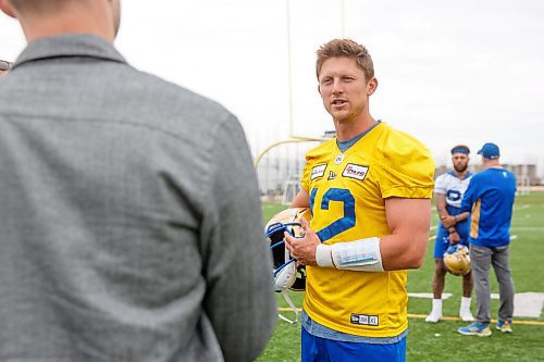 MIKE DEAL / WINNIPEG FREE PRESS
Winnipeg Blue Bombers quarterback Dakota Prukop (12) during a scrum with media after the first day of rookie camp at the practice field at the UofM Wednesday.
220511 - Wednesday, May 11, 2022.