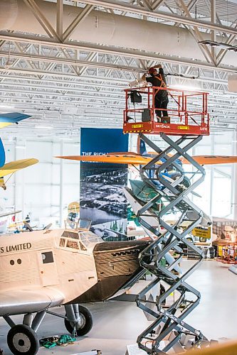 MIKAELA MACKENZIE / WINNIPEG FREE PRESS

Steve Puddister (with Eos Lightmedia) works on the lighting at the new Royal Aviation Museum of Western Canada in Winnipeg on Wednesday, May 11, 2022. For Al Small story.
Winnipeg Free Press 2022.