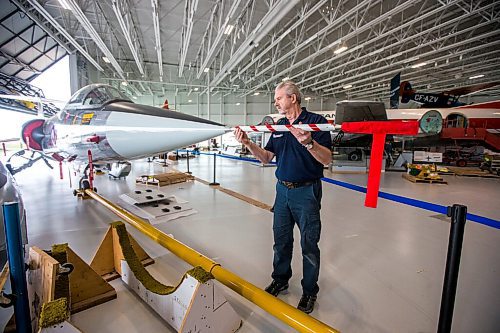 MIKAELA MACKENZIE / WINNIPEG FREE PRESS

Steve Pajot, owner the CF-104 Starfighter, puts the pitot boom onto the jet at the new Royal Aviation Museum of Western Canada in Winnipeg on Wednesday, May 11, 2022. For Al Small story.
Winnipeg Free Press 2022.