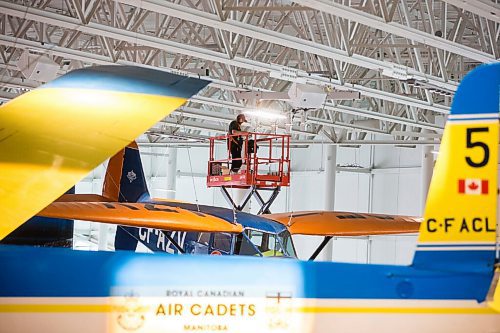 MIKAELA MACKENZIE / WINNIPEG FREE PRESS

Steve Puddister (with Eos Lightmedia) works on the lighting at the new Royal Aviation Museum of Western Canada in Winnipeg on Wednesday, May 11, 2022. For Al Small story.
Winnipeg Free Press 2022.