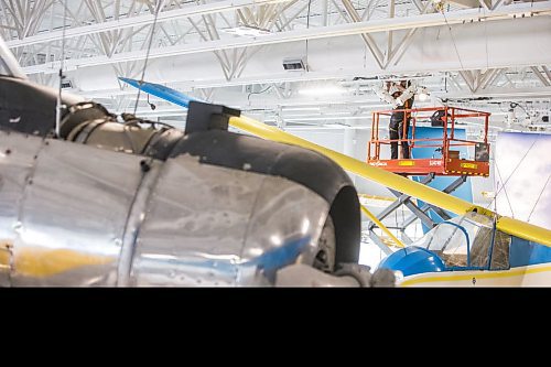 MIKAELA MACKENZIE / WINNIPEG FREE PRESS

Steve Puddister (with Eos Lightmedia) works on the lighting at the new Royal Aviation Museum of Western Canada in Winnipeg on Wednesday, May 11, 2022. For Al Small story.
Winnipeg Free Press 2022.