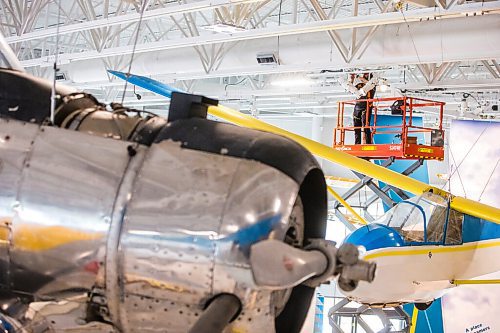 MIKAELA MACKENZIE / WINNIPEG FREE PRESS

Steve Puddister (with Eos Lightmedia) works on the lighting at the new Royal Aviation Museum of Western Canada in Winnipeg on Wednesday, May 11, 2022. For Al Small story.
Winnipeg Free Press 2022.