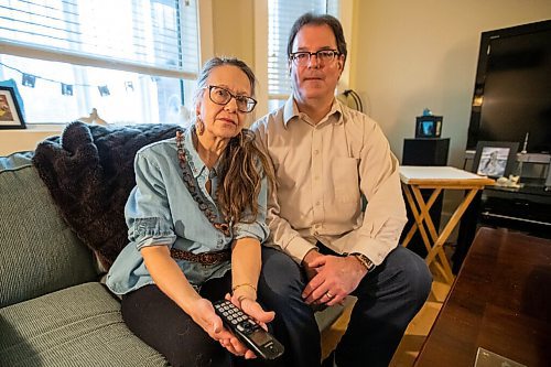 Daniel Crump / Winnipeg Free Press. Karen Kirk and husband Peter Ogrodnik sit in the living room of their west end home. Their landline telephone service was malfunctioning for more than a week and even dialled 911 several times, unbeknownst to them, leading to a late night visit from police Friday night. May 11, 2022.