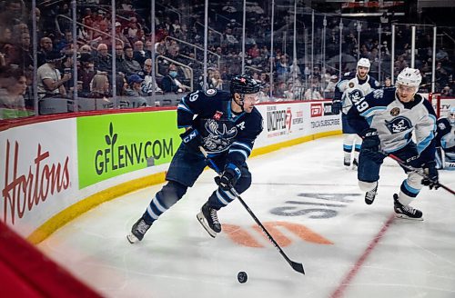 JESSICA LEE / WINNIPEG FREE PRESS

Manitoba Moose player David Gustafsson (19) skates with the puck during a game with the Milwaukee Admirals at Canada Life Centre on May 11, 2022.

Reporter: Mike McIntyre


