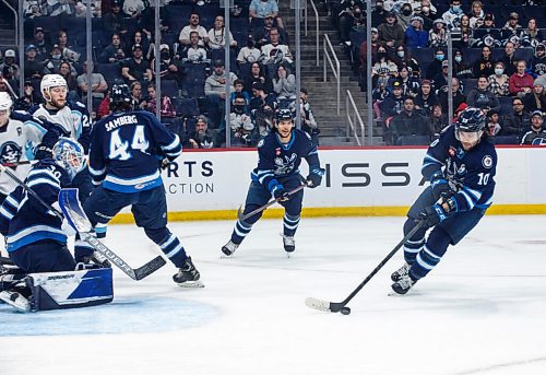 JESSICA LEE / WINNIPEG FREE PRESS

Manitoba Moose player Evan Polei (10) skates with the puck during a game with the Milwaukee Admirals at Canada Life Centre on May 11, 2022.

Reporter: Mike McIntyre

