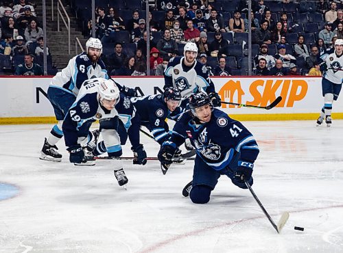 JESSICA LEE / WINNIPEG FREE PRESS

Manitoba Moose player Cole Maier (41) reaches for the puck during a game with the Milwaukee Admirals at Canada Life Centre on May 11, 2022.

Reporter: Mike McIntyre


