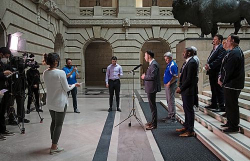 JESSICA LEE / WINNIPEG FREE PRESS

MLA Adrien Sala (at mic), joined by coaches, players and families, speaks to media about pushing for tougher rules to prevent sexual predators in high school coaching, at the Legislative Building on May 12, 2022.

Reporter: Danielle Da Silva



