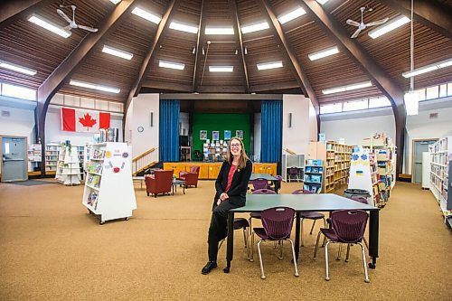 MIKAELA MACKENZIE / WINNIPEG FREE PRESS

Nicole Grégoire, head librarian of the Bibliothèque Régionale Jolys Regional Library, poses for a portrait in the library in St. Pierre-Jolys on Thursday, May 12, 2022. The local school division is planning to evict the regional library  a community hub which has been housed in a round building attached to the local French immersion school since 1968  due to enrolment pressures. For Maggie Macintosh story.
Winnipeg Free Press 2022.