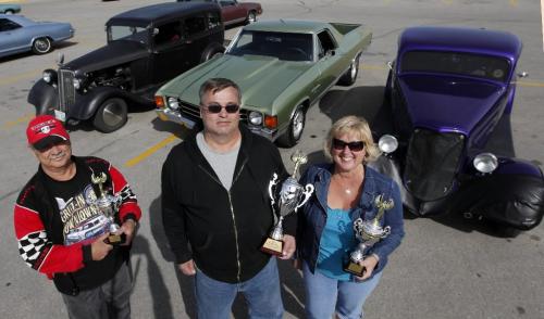 BORIS.MINKEVICH@FREEPRESS.MB.CA  100906 BORIS MINKEVICH / WINNIPEG FREE PRESS Costco #57 1st Annual Show and Shine(St. James). Winners Gary Minchin, 33 Dodge for best antique , Dennin Flemming, 72 El Cameno for people's choice, and Darlene McArdle, 33 ford coupe for best modified. All the money raised west to the United Way.