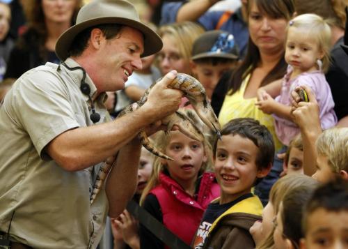 BORIS.MINKEVICH@FREEPRESS.MB.CA  100909 BORIS MINKEVICH / WINNIPEG FREE PRESS Safari Jeff (Jeff McKay) puts on a traveleing reptile show called "Living Wild" at Kildonan Place Shopping Centre. The show runs until Sept 12th. Here the kids get to get a close look at Skeeter and Scooter, a pair of blue tounge skinks.