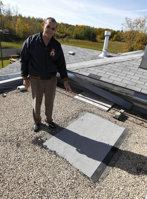 BORIS.MINKEVICH@FREEPRESS.MB.CA  100919 BORIS MINKEVICH / WINNIPEG FREE PRESS Legion 215 president Robert Beach poses for a photo on the roof of the legion where theives broke in earlier in the year.