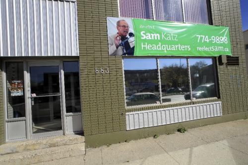 MIKE.DEAL@FREEPRESS.MB.CA 100928 - Tuesday, September 28, 2010 -  The Sam Katz headquarters on Notre Dame with signs of Sam that have been altered (photoshoped). MIKE DEAL / WINNIPEG FREE PRESS