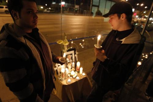 BORIS.MINKEVICH@FREEPRESS.MB.CA  100928 BORIS MINKEVICH / WINNIPEG FREE PRESS A vigil in the memory of murder victim Darren Walsh at the corner of Euclid St. Avenue and Main Street. Cousin of murder victim Matthew Mohamed and brother of victim Trevor Walsh in the bus shack.