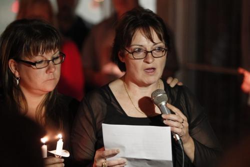 BORIS.MINKEVICH@FREEPRESS.MB.CA  100928 BORIS MINKEVICH / WINNIPEG FREE PRESS A vigil in the memory of murder victim Darren Walsh at the corner of Euclid St. Avenue and Main Street. Mother of murder victim Nancy Goulet talks. No ID on the other person in left.
