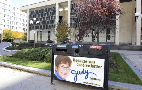 MIKE.DEAL@FREEPRESS.MB.CA 100930 - Thursday, September 30, 2010 -  Mayoral challenger Judy Wasylycia-Leis has a very noticeable promotional sign on a recycling bin steps from City Hall in downtown Winnipeg. MIKE DEAL / WINNIPEG FREE PRESS