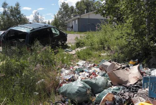 JOE.BRYKSA@FREEPRESS.MB.CA NO RUNNING WATER FEATURE-(See Helen's story)  - The yard of Zach Harper's home in St.Theresa Point First Nation. Their dump is meters away from their home. The family lives with no running water.   - July 2010, - JOE BRYKSA/WINNIPEG FREE PRESS
