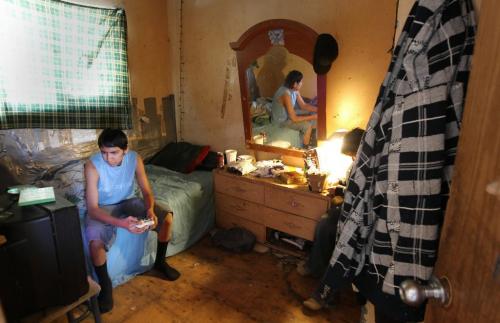 JOE.BRYKSA@FREEPRESS.MB.CA NO RUNNING WATER FEATURE-(See Helen's story) - Norman Rae plays video games in the Harper home on St.Theresa Point First Nation - March 2010, - JOE BRYKSA/WINNIPEG FREE PRESS