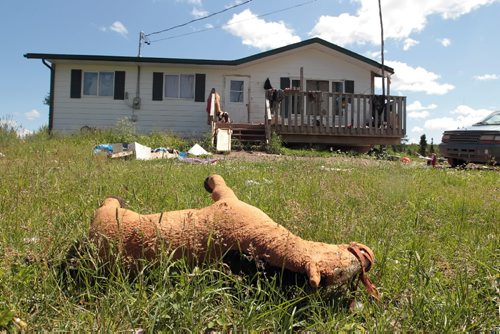 JOE.BRYKSA@FREEPRESS.MB.CA NO RUNNING WATER FEATURE-(See Helen's story)  -  Home of Robert Little on the Garden Hill First Nation. His family has contamination problem with cistern that has forced family to boil water- July 2010, - JOE BRYKSA/WINNIPEG FREE PRESS