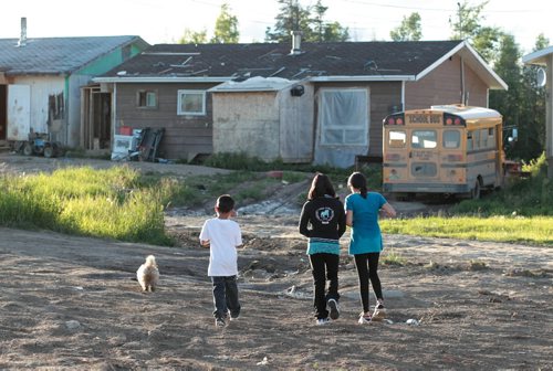 JOE.BRYKSA@FREEPRESS.MB.CA NO RUNNING WATER FEATURE-(See Helen's story)  -    Children walk down a road in  Red Sucker Lake First Nation - July , 2010, - JOE BRYKSA/WINNIPEG FREE PRESS