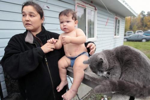 JOE.BRYKSA@FREEPRESS.MB.CA NO RUNNING WATER FEATURE-(See Helen's story)   Grandmother Shayle Moneyas with grandchild Xavier in Hollow Water First Nation ( Eds: this child's skin condition has nothing to do with no running water)- JOE BRYKSA/WINNIPEG FREE PRESS