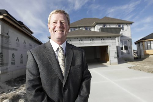 TREVOR HAGAN / WINNIPEG FREE PRESS - Mike Moore, President of the Manitoba Home Builders Association, spoke about new rules being implemented to make homes more environmentally friendly at a news conference this morning in Royalwood. 10-10-15