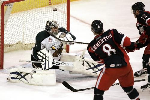 Manitoba Moose goalie Eddie Lack (31) makes the save on a shot from Grand Rapids Griffens Cory Emmerton (8)) during the second period of their game in Winnipeg Friday, October 15, 2010.    Winnipeg Free Press/John Woods