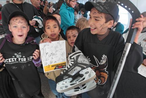 JOE.BRYKSA@FREEPRESS.MB.CA Local- Sharpie Face- L to R- Ashton Hjorleifson, and brothers Quinlin Bricklin, Jayce and Raeden were all marked up with autographs at the 3rd annual Manitoba Moose Community Pancake breakfast at the Gateway Community Center at 1717 Gateway Road on Sunday morning. Every player with the Manitoba Moose were in attendance - Oct 17, 2010- JOE BRYKSA/WINNIPEG FREE PRESS