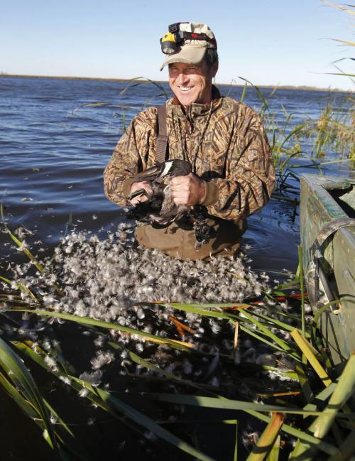 BORIS.MINKEVICH@FREEPRESS.MB.CA  101018 BORIS MINKEVICH / WINNIPEG FREE PRESS Delta Waterfowl Director of Conservation Policy Jim Fisher plucks a duck he shot in Delta Marsh.