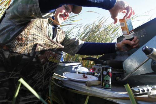 BORIS.MINKEVICH@FREEPRESS.MB.CA  101018 BORIS MINKEVICH / WINNIPEG FREE PRESS Delta President Rob Olson cooks up a duck breakfast in Delta Marsh