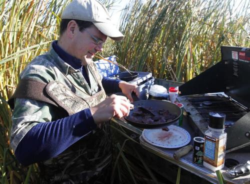 BORIS.MINKEVICH@FREEPRESS.MB.CA  101018 BORIS MINKEVICH / WINNIPEG FREE PRESS Delta President Rob Olson cooks up a duck breakfast in Delta Marsh