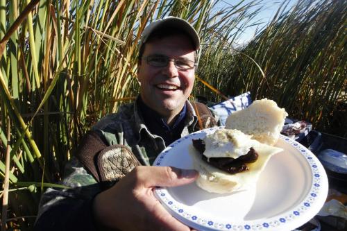 BORIS.MINKEVICH@FREEPRESS.MB.CA  101018 BORIS MINKEVICH / WINNIPEG FREE PRESS Delta President Rob Olson cooks up a duck breakfast in Delta Marsh. Here is the finished product, an egg cheese duckwich!