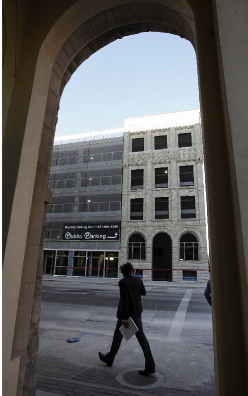 KEN GIGLIOTTI / WINNIPEG FREE PRESS  / Oct  21 2019 - 101021 - The 159-stall Bedford Parkade in the Exchange District officially opens Friday at the southwest corner of King Street and Bannatyne Avenue, where the Ryan Block stood from 1895 until 2009.THe new building  is built  to be in character with the Exchange Bldgs using recycle brick   and retro design on the corner section of the structure .
