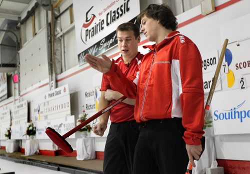 Ruth Bonneville Winnipeg Free Press Oct 22, 2010 Sports - Skip Jason Gunnlaugson (right) with third Justin Richter talk about their next play during  draw against team Stewart during the Prairie Classic at Portage Curling Club Friday morning.