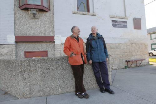 BORIS.MINKEVICH@FREEPRESS.MB.CA   BORIS MINKEVICH / WINNIPEG FREE PRESS 101103 Morley Rypp and Dick Bevan pose for a photo in front of the old Stella Mission. Basketball story.