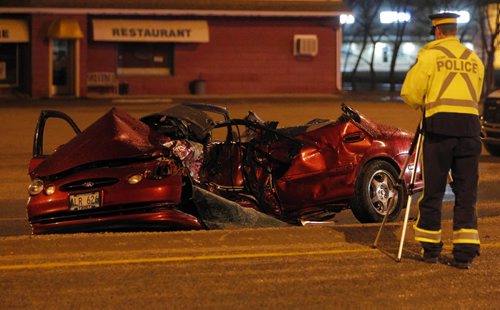 BORIS.MINKEVICH@FREEPRESS.MB.CA   BORIS MINKEVICH / WINNIPEG FREE PRESS 101110 Fatal MVC on southbound McPhillips at Grassmere. Car in photo vs. pickup truck.