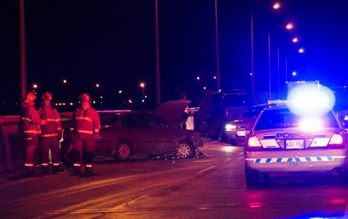DAVID LIPNOWSKI / WINNIPEG FREE PRESS (November 11, 2010) Police and Fire crews were at the scene of a multi vehicle accident on the Perimeter Highway on the bridge over the Red River between Main St. and Henderson Highway Thursday night.