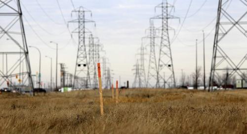 MIKE.DEAL@FREEPRESS.MB.CA 101112 - Friday, November 12, 2010 -  A series of Manitoba Hydro stakes are all that can be seen of the construction of a multi-use path along Lagimodiere close to Fermor. See Bartley Kives story. MIKE DEAL / WINNIPEG FREE PRESS