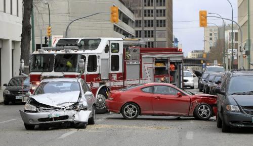 MIKE.DEAL@FREEPRESS.MB.CA 101113 - Saturday, November 13, 2010 -  A four car pile-up just south of Donald Street and Broadway caused traffic problems in the area around midday Saturday. No injuries were immediately reported at the scene. MIKE DEAL / WINNIPEG FREE PRESS