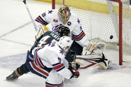 November 13, 2010 - 101113  - Rochester Americans  Clay Wilson (5) can't stop Manitoba Moose Chris Tanev (43) from scoring on his goalie  Jacob Markstrom (30) in the second period of their AHL game in Winnipeg  Saturday November 13, 2010.  John Woods / Winnipeg Free Press