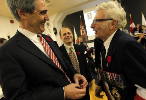 BORIS.MINKEVICH@FREEPRESS.MB.CA   BORIS MINKEVICH / WINNIPEG FREE PRESS 101114 Liberal Leader Michael Ignatieff,left, made his fourth campaign stop in three months this afternoon in Winnipeg North. The byelection candidate Kevin Lamoureux, middle, and Ignatieff chat with Polish War Veteran Stephan Olbrecht, right, at a celebration of Polish independence at the Polish Fraternal Aid Society of St. John Cantius on Mountain Avenue, where about 60 people were gathered.
