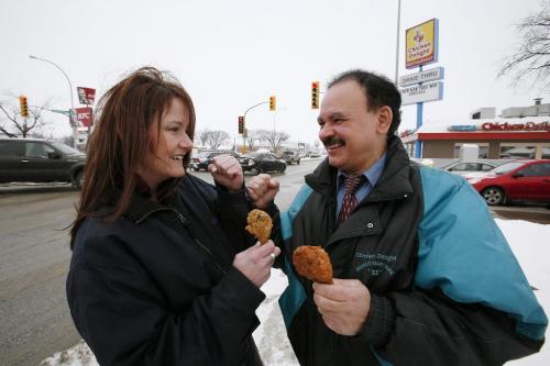 November 29, 2010 - 101129  -  Carol James, a Director for KFC and  Joe Da Silva, Corporate Supervisor for Chicken Delight pose for a photo on Monday, November 29, 2011.    John Woods / Winnipeg Free Press