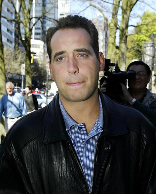 Frank Biller leaves British Columbia Supreme Court in Vancouver April 30, 2002. Biller has been charged with 33 counts of fraud and theft in Eron Mortgage scandal.  Lyle Stafford/Winnipeg Free Press