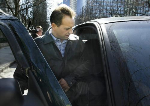 Frank Biller leaves the British Columbia Supreme Court in Vancouver April 30, 2002. Biller has been charged with 33 counts of fraud and theft in the Eron Mortgage scandal.  Lyle Stafford/Winnipeg Free Press