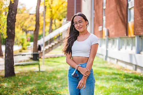 MIKAELA MACKENZIE / WINNIPEG FREE PRESS

Miyawata Stout, who responded to the bullet point in poll that her generation has much better idea of hope for their lives than previous generations, poses for a portrait in front of Kelvin High School in Winnipeg on Monday, Sept. 27, 2021. For --- story.
Winnipeg Free Press 2021.