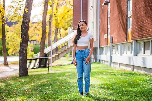 MIKAELA MACKENZIE / WINNIPEG FREE PRESS

Miyawata Stout, who responded to the bullet point in poll that her generation has much better idea of hope for their lives than previous generations, poses for a portrait in front of Kelvin High School in Winnipeg on Monday, Sept. 27, 2021. For --- story.
Winnipeg Free Press 2021.