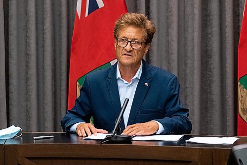 Daniel Crump / Winnipeg Free Press. Ron Schuler, Manitoba&#x2019;s Minister of Infrastructure, speakers during a press conference at the Manitoba legislature Thursday afternoon. The minister has recently found himself under scrutiny regarding his vaccination status. July 22, 2021.