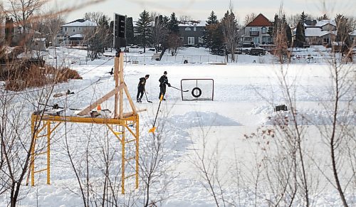 RUTH BONNEVILLE / WINNIPEG FREE PRESS



Local - Retention Ponds, skating



Two 14-year-old boys practice taking shots at the net on a retention pond that has been cleared off to skate on in South St. Vital Tuesday.



See story retention ponds debate with Coun. Lukes.  Joyanne 



Jan 06,. 2021