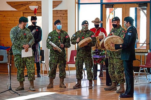 Daniel Crump / Winnipeg Free Press. Warriors of the Royal Winnipeg Rifles drum as part of the ceremony during the the Manitoba Indigenous Veterans virtual commemoration event for National Indigenous Veterans Day at Thunderbird House in Winnipeg. November 8, 2021.