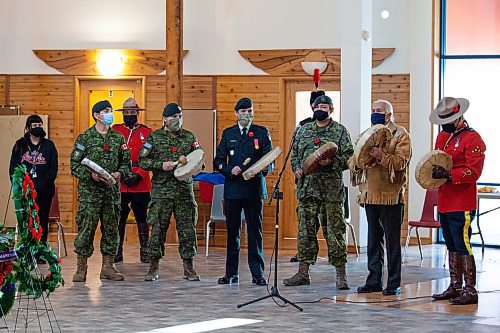 Daniel Crump / Winnipeg Free Press. Warriors of the Royal Winnipeg Rifles and Elder Dr. Winston Wuttunee perform the closing honour and prayer song as part of the ceremony during the Manitoba Indigenous Veterans virtual commemoration event for National Indigenous Veterans Day at Thunderbird House in Winnipeg. November 8, 2021.